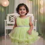 Lime green one -shoulder flower party frock with diamond belt